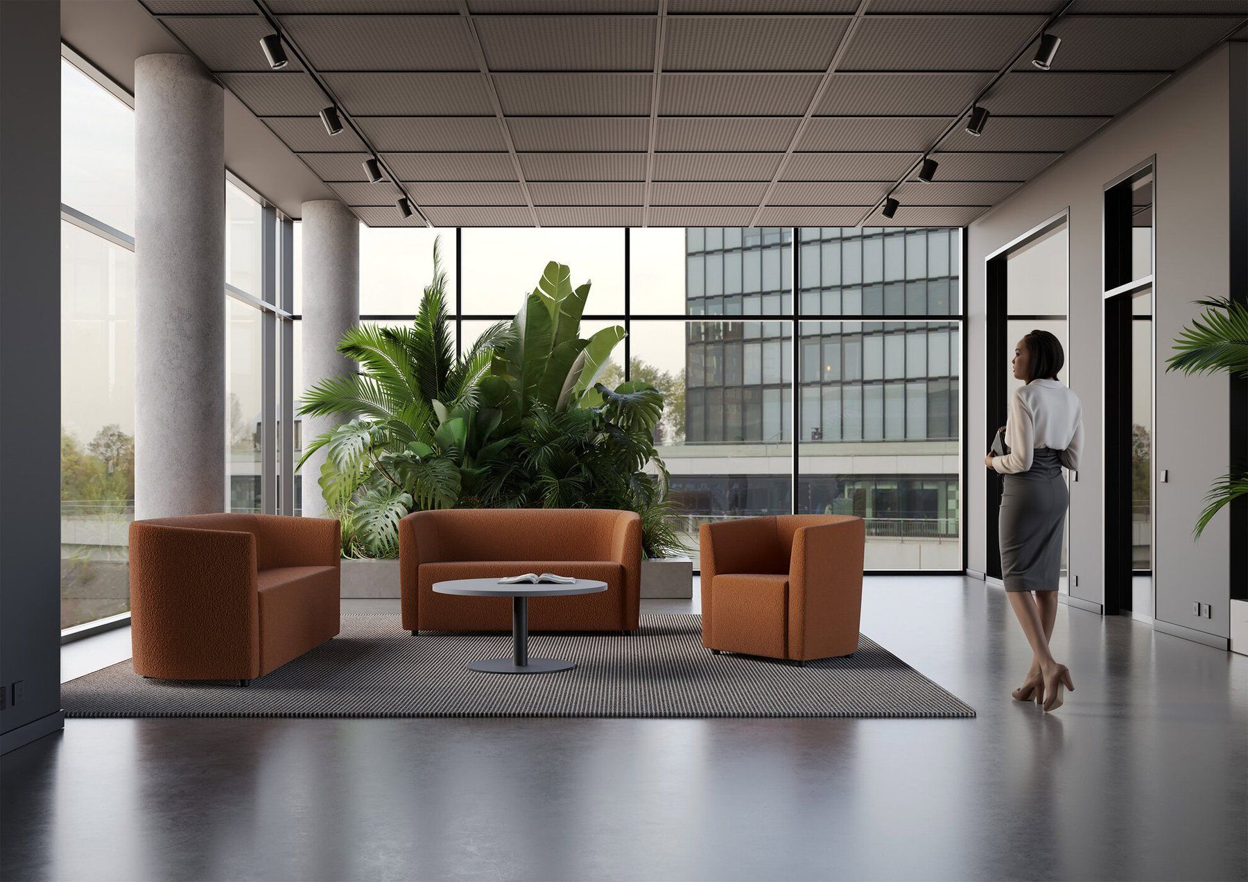 OFGO Studio lounge seating in an open office with tall windows